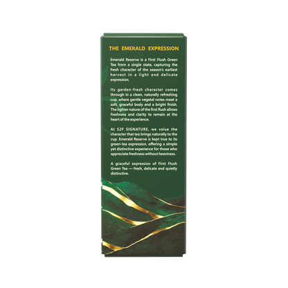 S2F Signature Emerald Reserve Pure Green Tea 100g box packaging right side view showing The Emerald Expression description text on transparent background